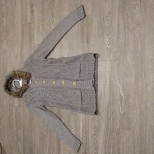 Women's Long Sleeve hooded casual sweater with 2 front pockets .